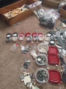 Ricardo uses containers with tight fitting lids to store his LEGO bricks.