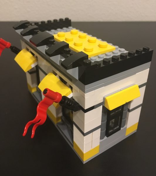 The brick-built 2 by 4 LEGO brick on the roof adds a special touch.