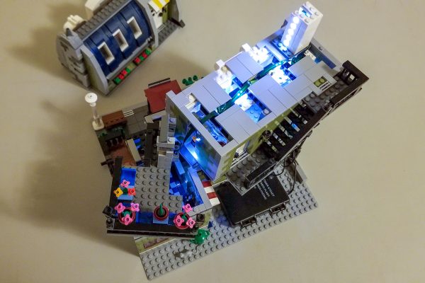 Parisian Cafe with Cove Lighting and Vertical Light Bar.