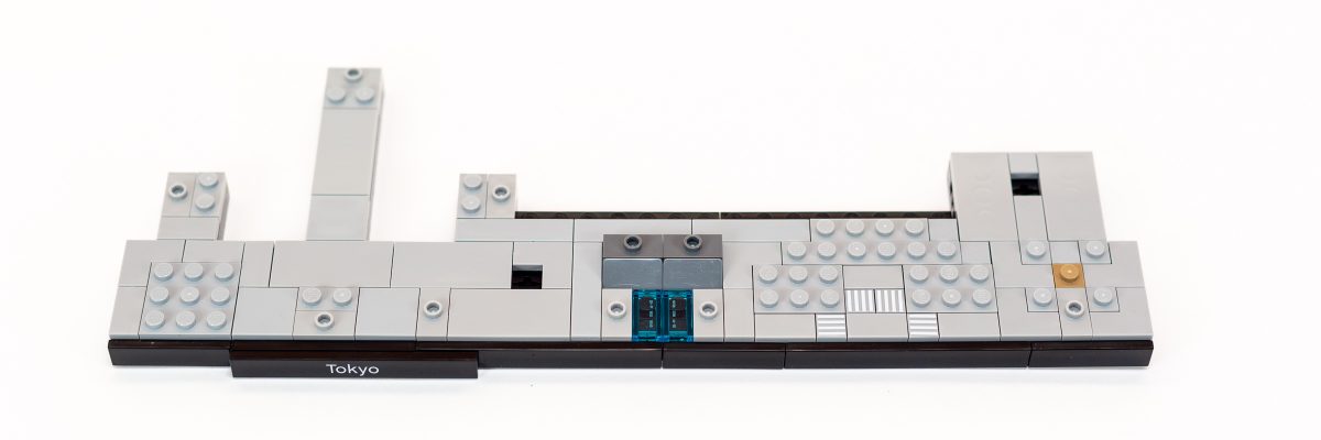 Base with two holes containing Technic Axle connectors.