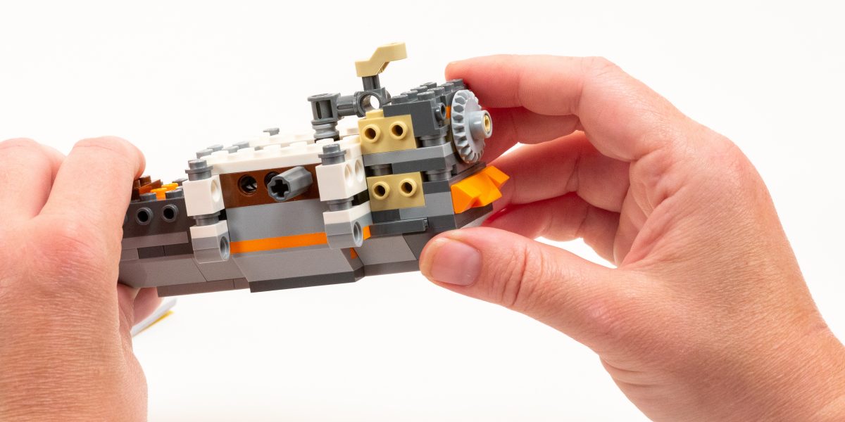 Both Technic and regular bricks used to create the central assembly,.