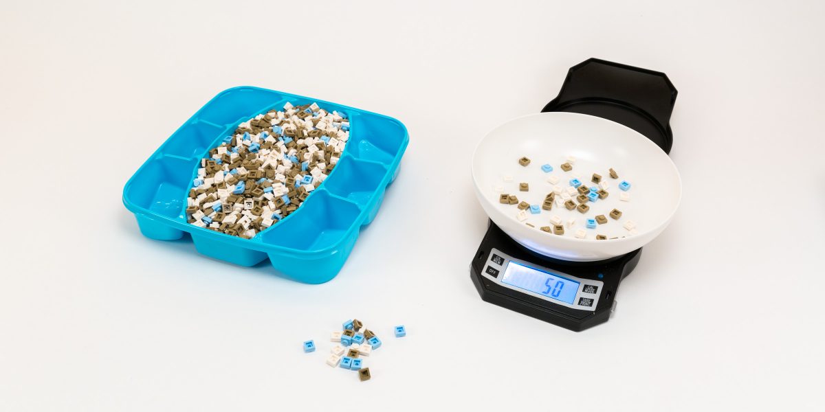 Measuring the storage capacity of each compartment using a counting scale.