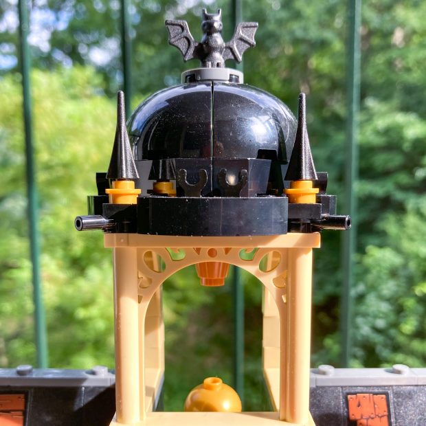 Gothic spikes adorn the bell tower and there's a bat on the top.