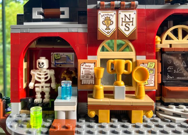 The eigth minifigure, a skeleton, is tucked in the closet.