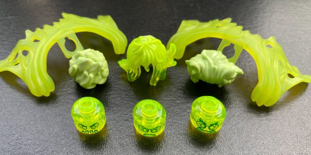 The Trans-Neon Green and a Spring Yellowish Green color accentuate the haunted vibe.