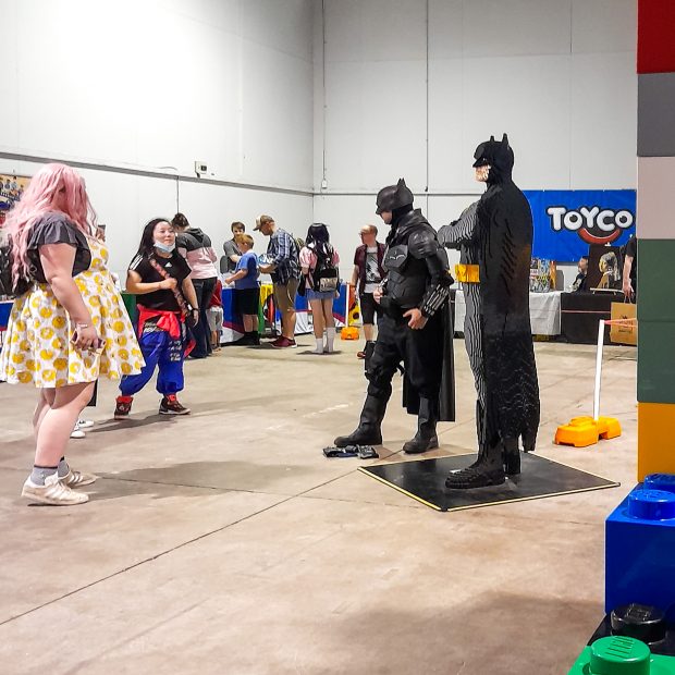 Batman meets his brick likeness.