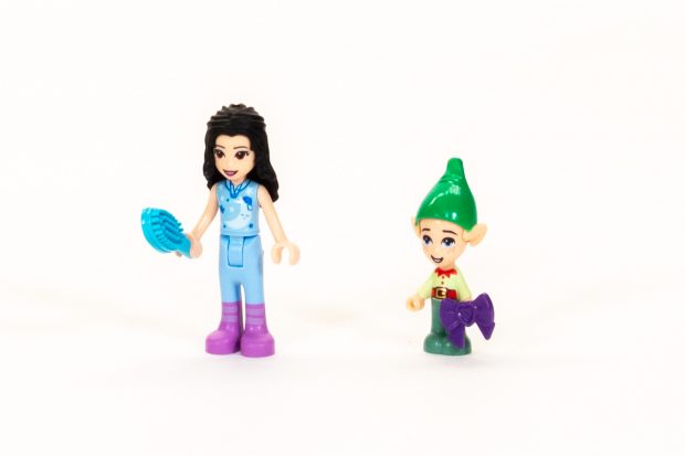 Emma with blue pajamas, and Elf with purple bow.