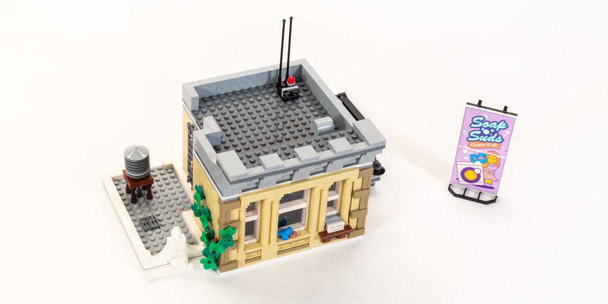 The final stage includes the roof, a water tower and billboard.