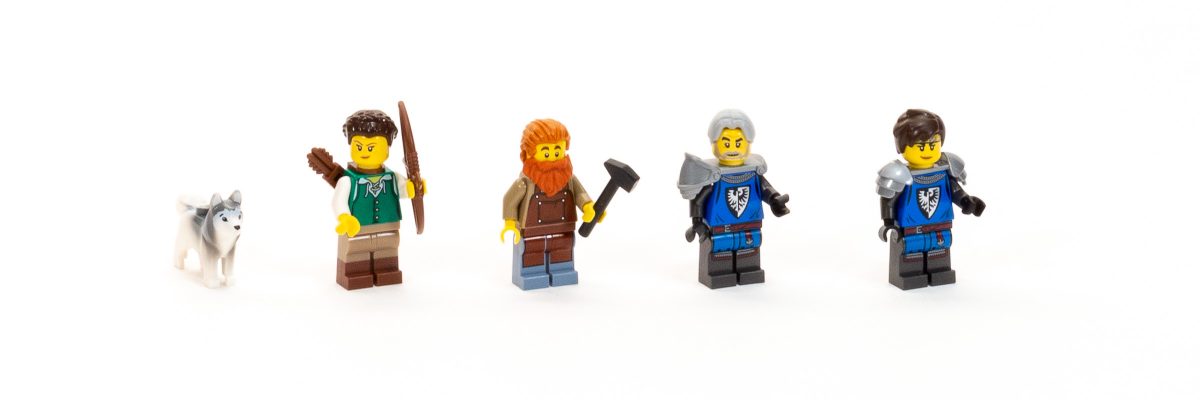 The set includes four minifigures, a dog, and a horse (not pictured).