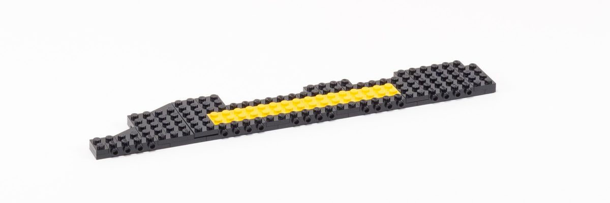 The base is 37 studs wide and 10 studs deep (due to the angled section).