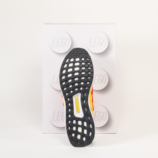 The outersole is thin and has holes in it (presumably to reduce weight).