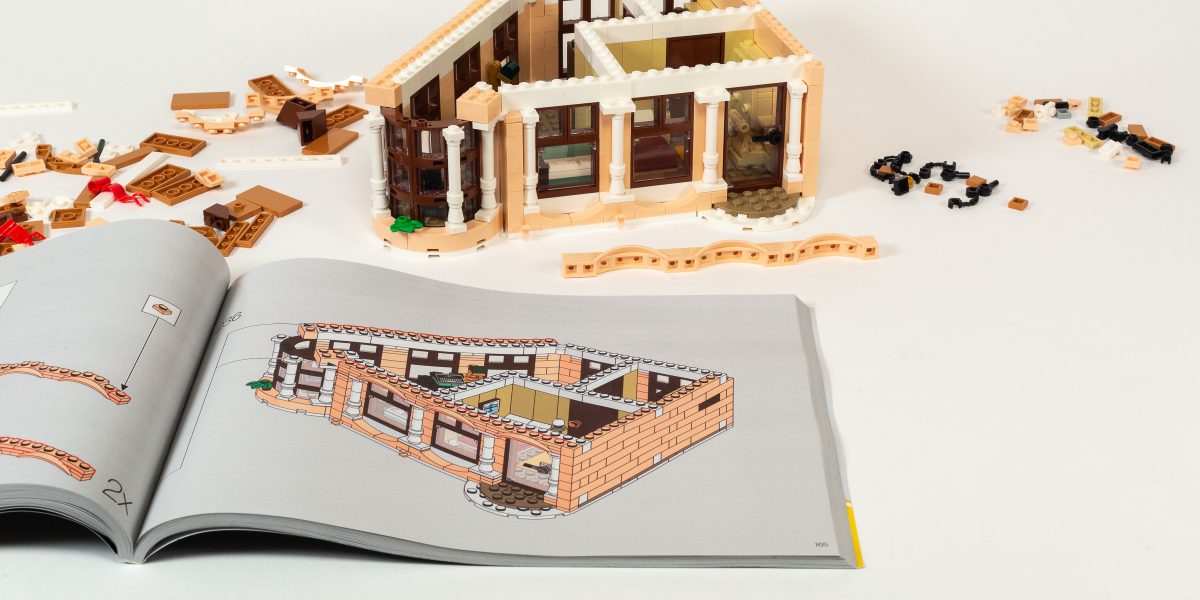 Adding columns and arches to the second floor.