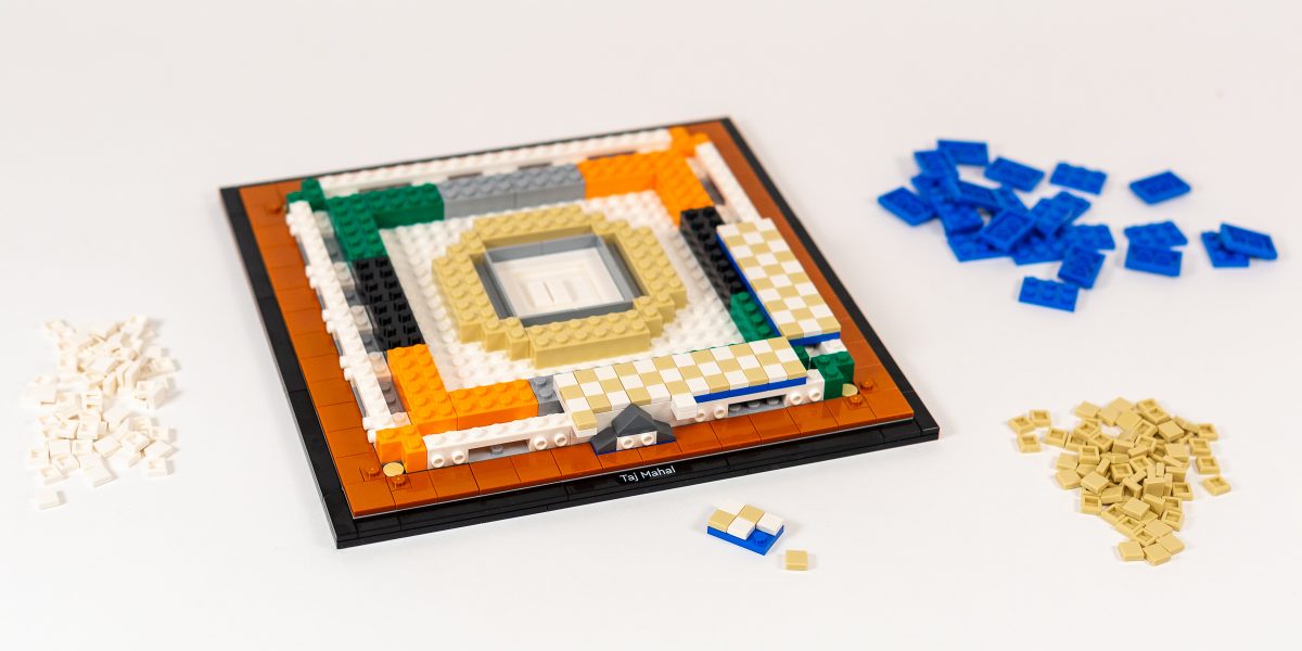 Carefully assembling 2×3 panels of tiny square tiles.