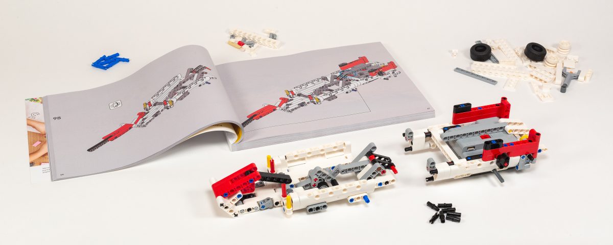 Marrying front and back sections and connecting the linkage.