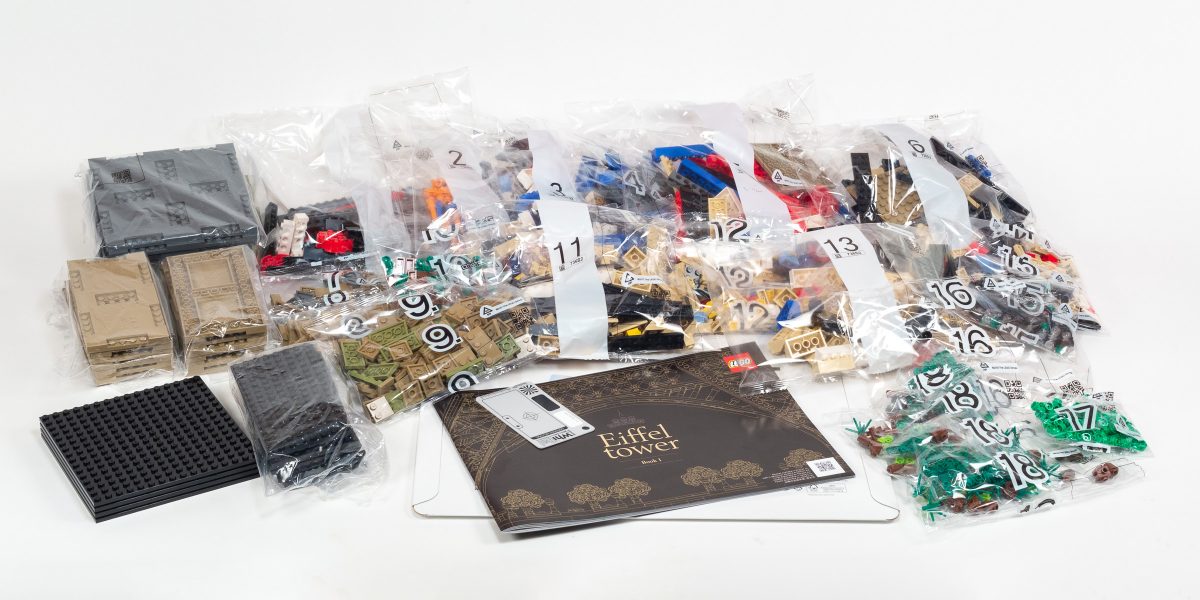 The first box includes several loose parts and unmarked bags, plus numbered bags for the first 18 stages of the build.