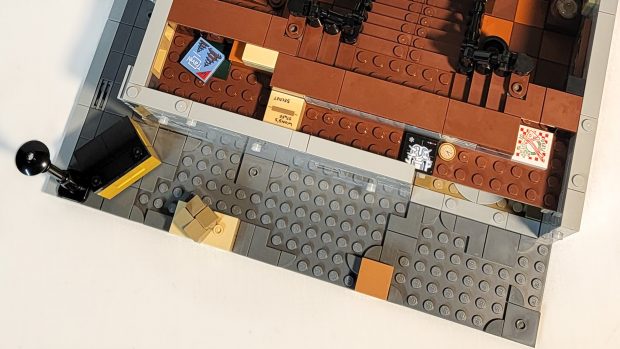 You can find Wong's Magazines and pizza boxes hidden in the floor.