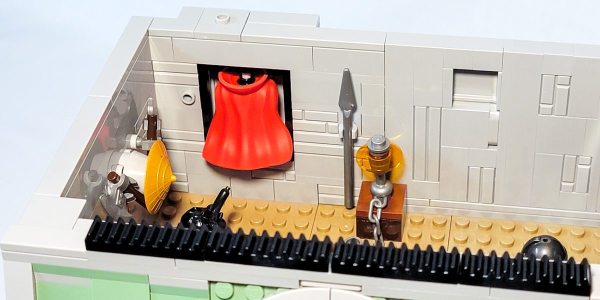 A small recess in the back wall is a perfect place to hang your cloak.