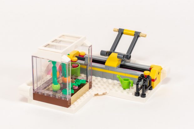 Rooftop greenhouse and support for scaffolding.