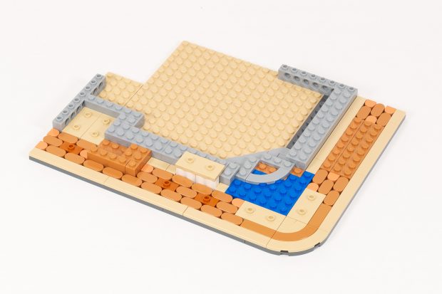 The restaurant has a larger foundation than the tower.