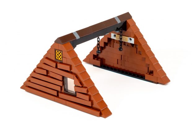 The two peaks are connected by a long beam with chains hanging from it (which we will use later).