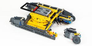 A separate motor on each side will allow it to more forward and back, and to turn by rotating them in opposite directions.