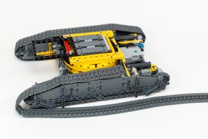 The treads loop around the gears pretty easily.