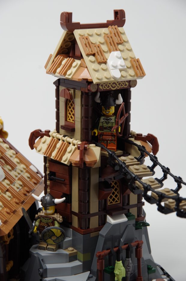As the first line of defense, the archer stands ready on the watchtower.