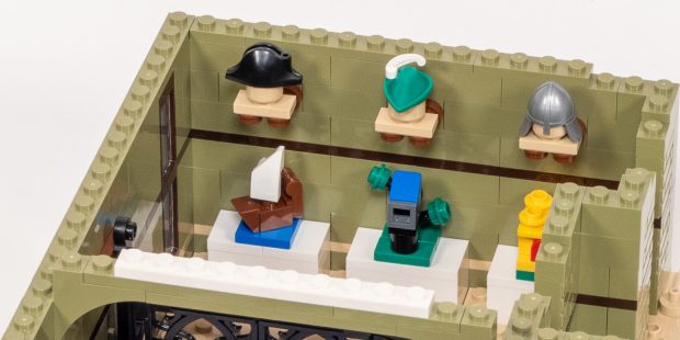 Pirate hat, Forestmen's hat, and Castle helmets hanging on the wall.