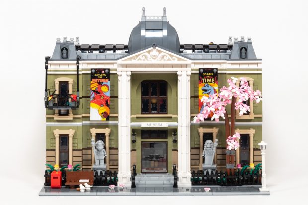 The Mansard Roof and large columns are appropriate to the French Second Empire style.