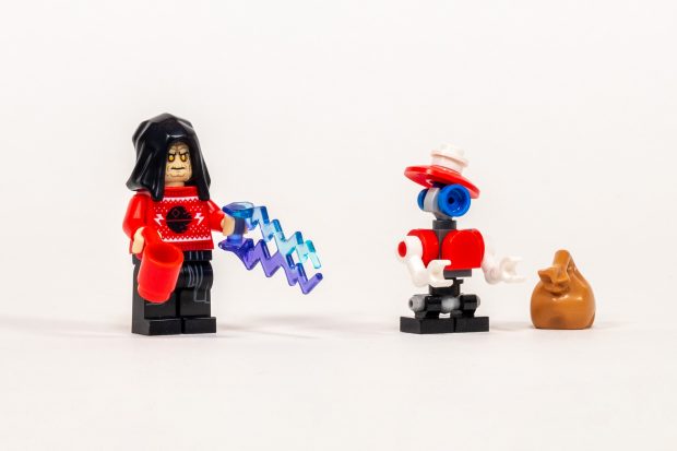 Palpatine has a festive sweater, and the Pit Droid has a bag full of toys.