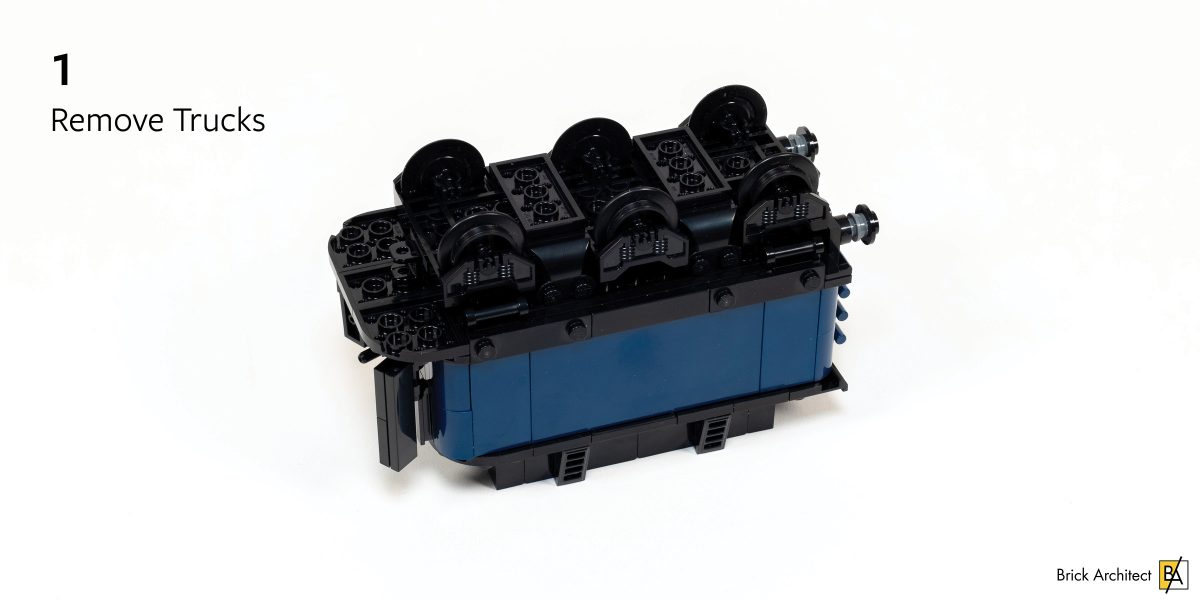 Flip the tender upside-down and remove the trucks.