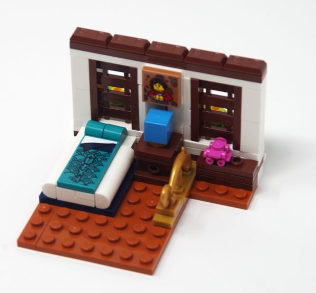 While simple the bedroom is cozy.