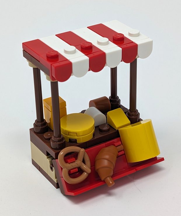 A variety of different cheeses are created using very few pieces in different shapes and colors.