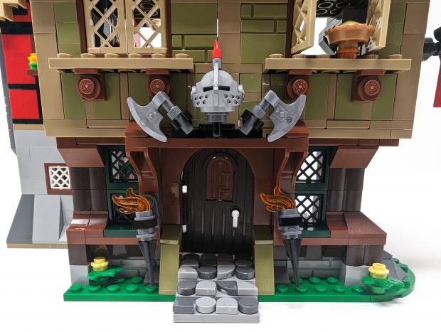 This entry way and structural facade does not hold back with its details.