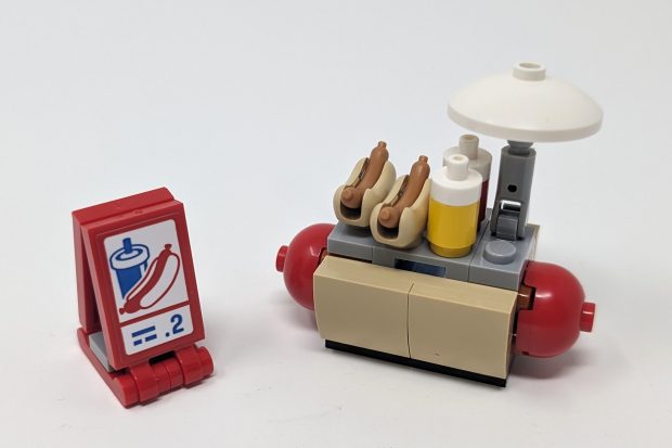 The signage for the hot dogs and drink resemble that of the signage used in Costo stores.