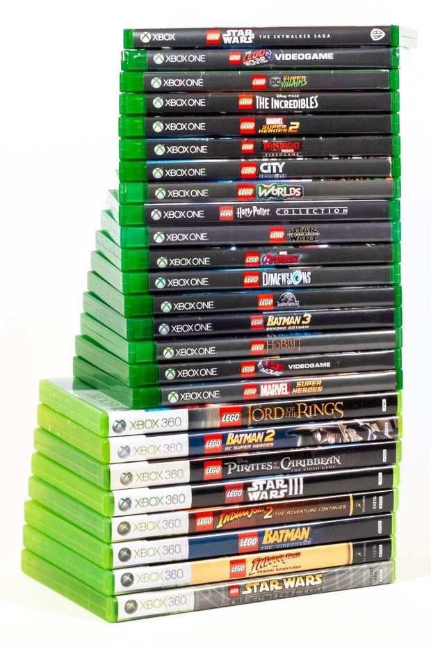 Stack showing all of the LEGO games produced by TT / Traveler's Tales.
