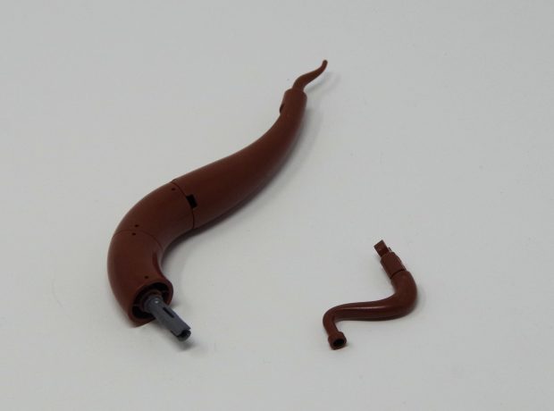 Roots are built using a variety of different tubes and animal pieces in a reddish brown color.