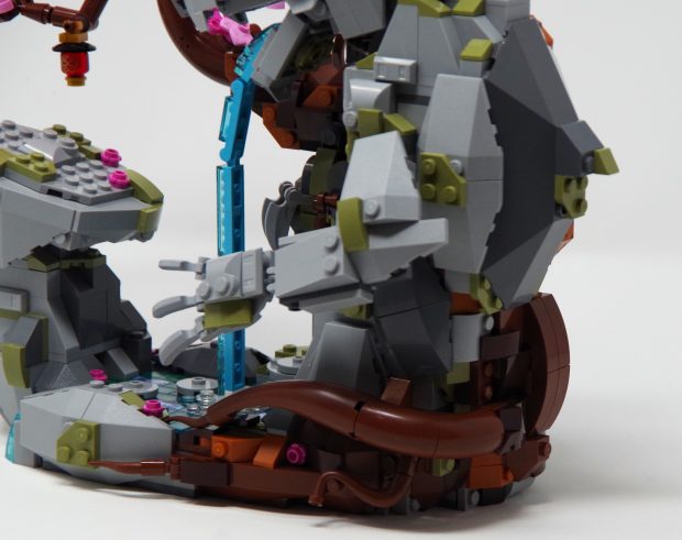 The roots snake around the base of the structure.