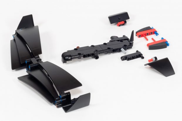 The scalloped front end is added in bag 9.