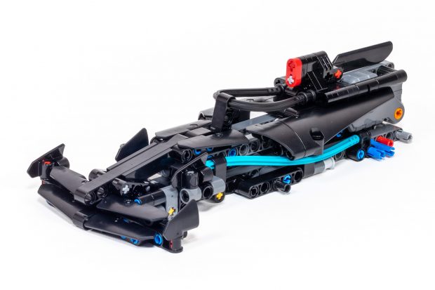 Adding the curvy bright bluish green racing stripes in bag 3.