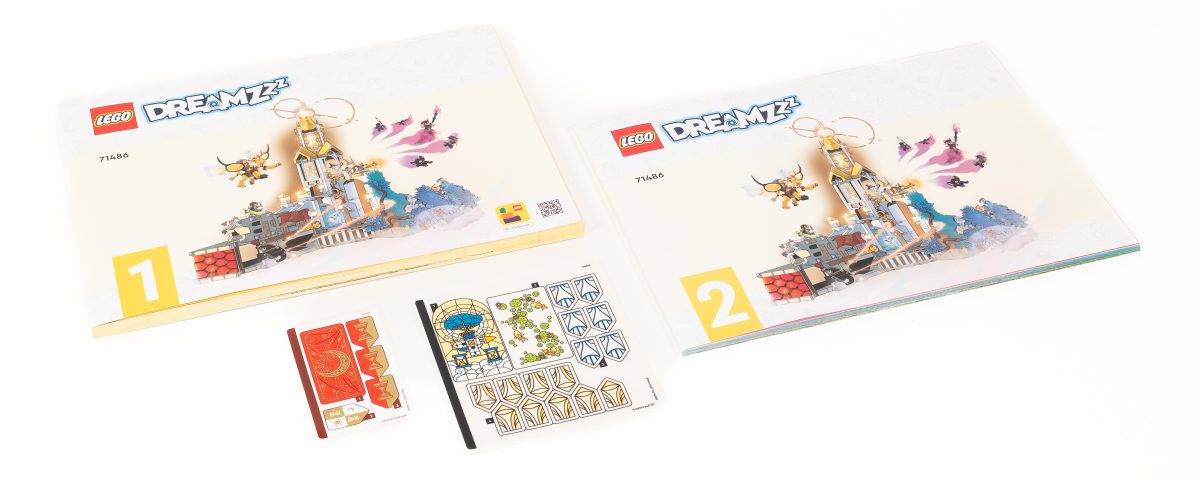 The set includes two instruction booklets and two sticker sheets.
