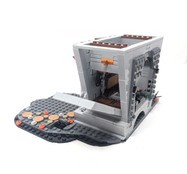 The side of the building pops open to show the details within.