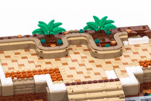 A backdrop of ferns created using curved blades with a clip connection.