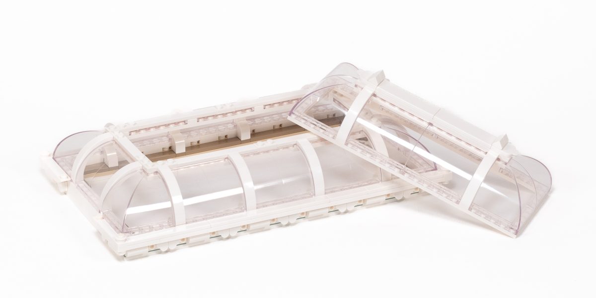 The large central roof is comprised of two layers of windows.