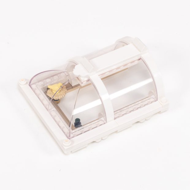 Each side is covered by a small roof segment like this, although only one side has a bird's nest.