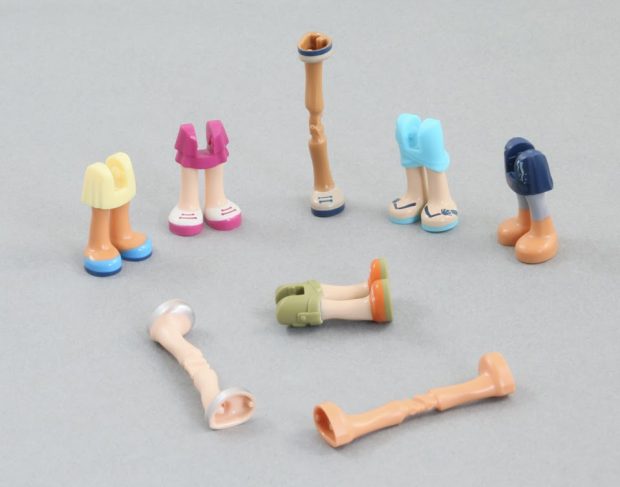 New Elementary showcasing how LEGO Friends legs are made using 'overmoulding' technique.