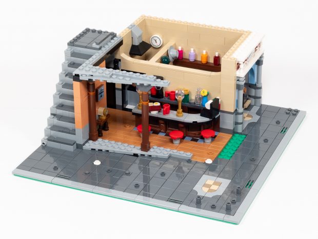 Two columns hold up an angled section of roofline.