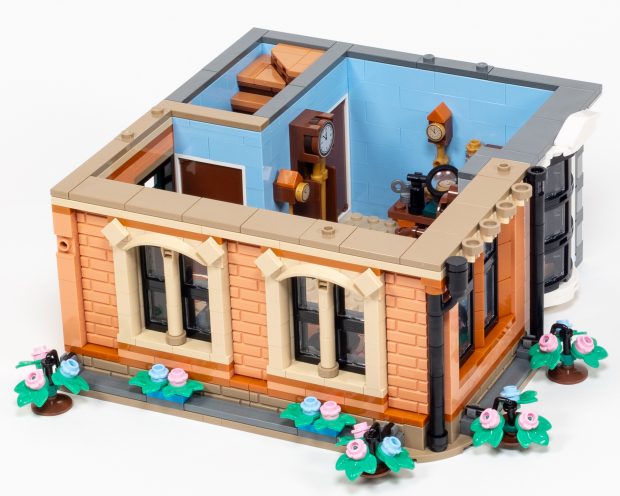 Adding the front facade and hanging plants to the second floor.