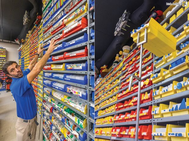 PJ Catalano showing a custom tool that was made to get bins from the top rows.