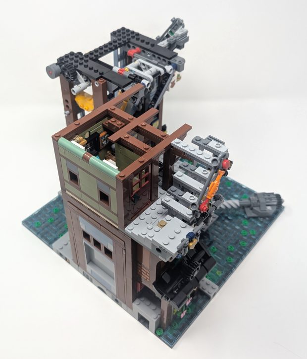 A multi level structure with exposed staircases showcases the vertical flow of NINJAGO City.
